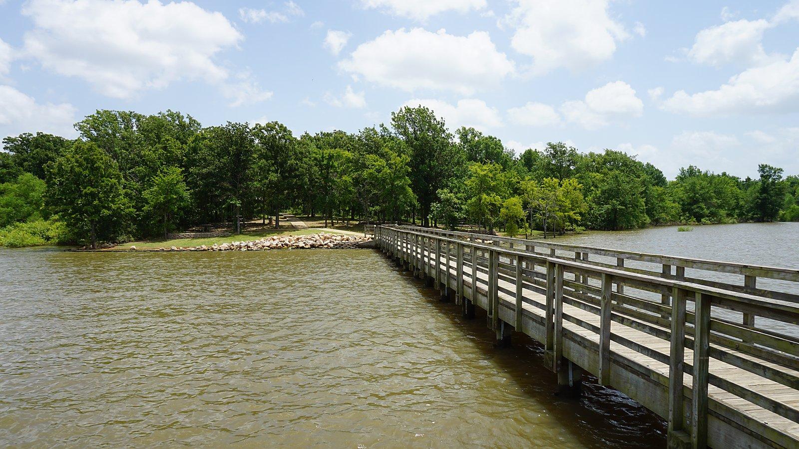 Boardwalk fishing pier over a Texas lake